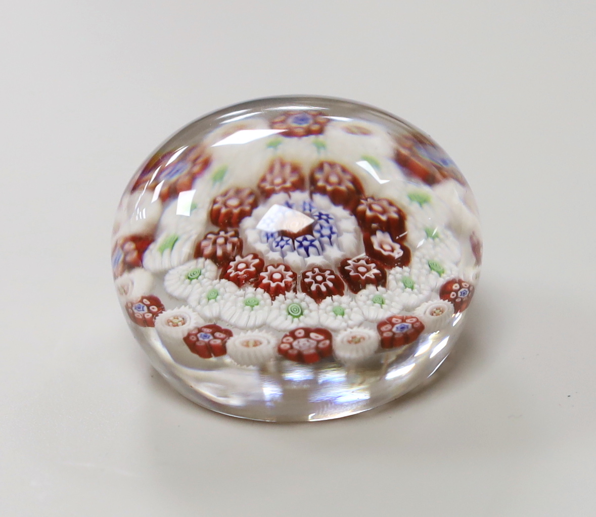 A Baccarat concentric millefleur cane paperweight, approximate diameter 4.25